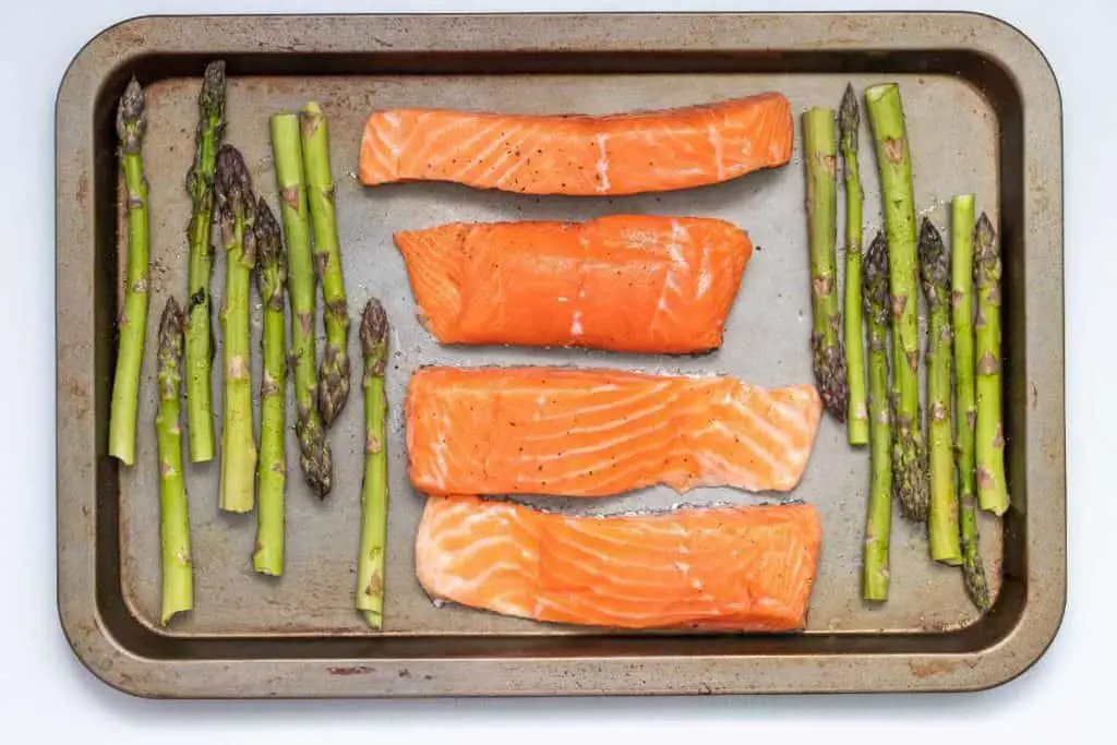 salmon and asparagus on tray