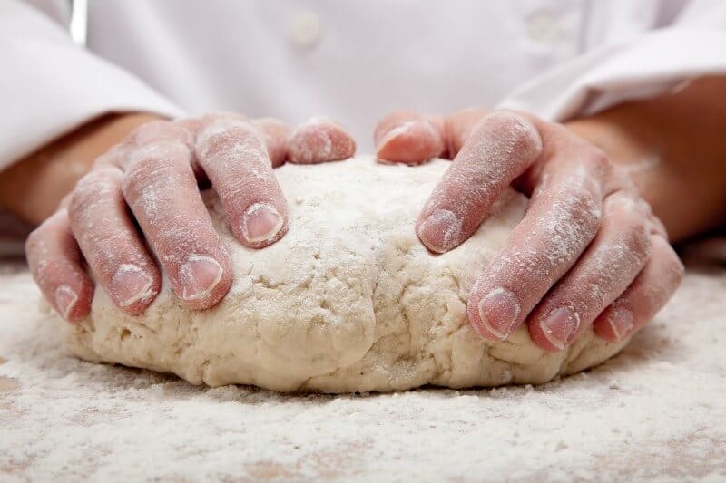 kneading bread dough