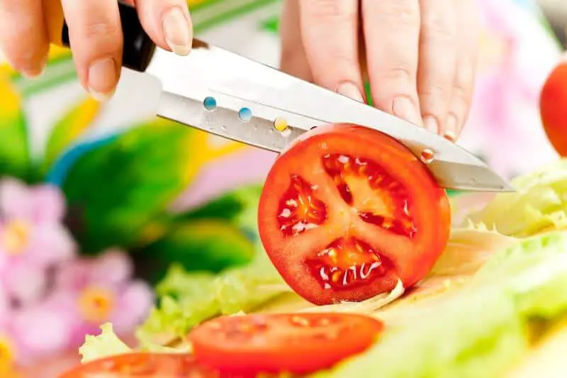 cutting a tomato