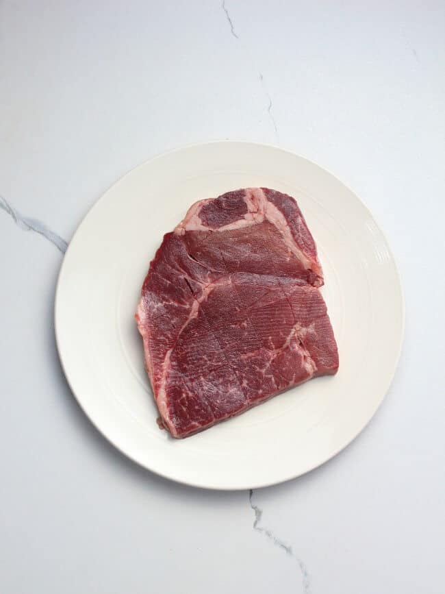 London broil meat cut with crisscross pattern