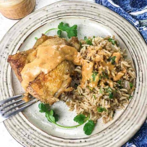 Dutch Oven Chicken Rice with Peanut-Sriracha Sauce