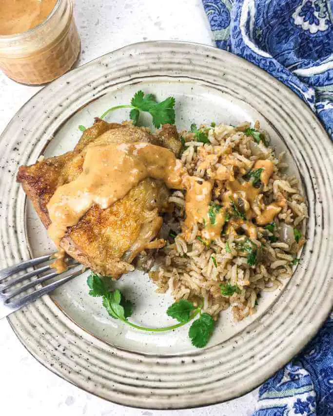 Dutch Oven Chicken Rice with Peanut-Sriracha Sauce