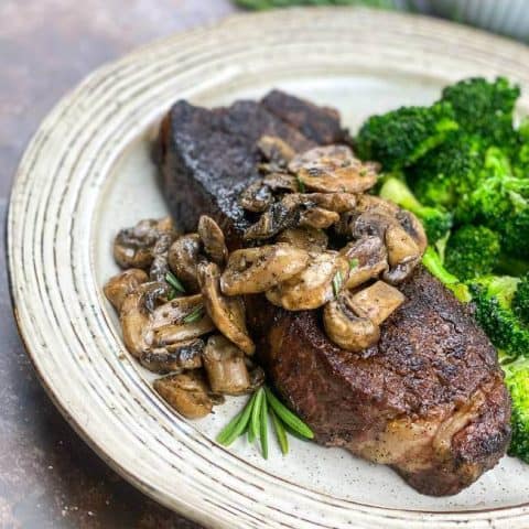 strip steak with mushroom and broccolli