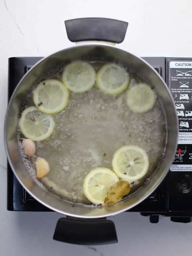 boiling water with lemon and spices