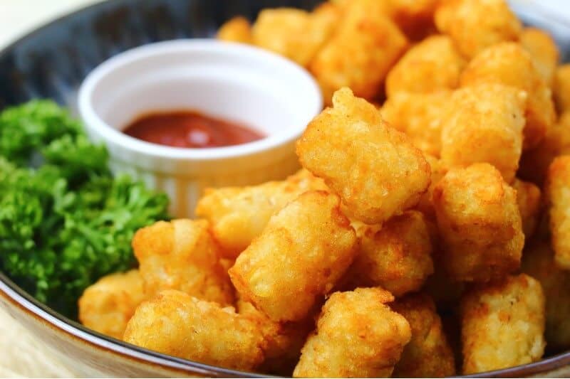 tatter tots with ketchup close up