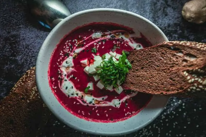 colorful beet root soup and bread