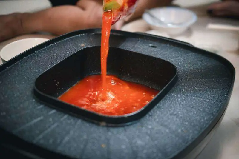 red sauce in electric pot