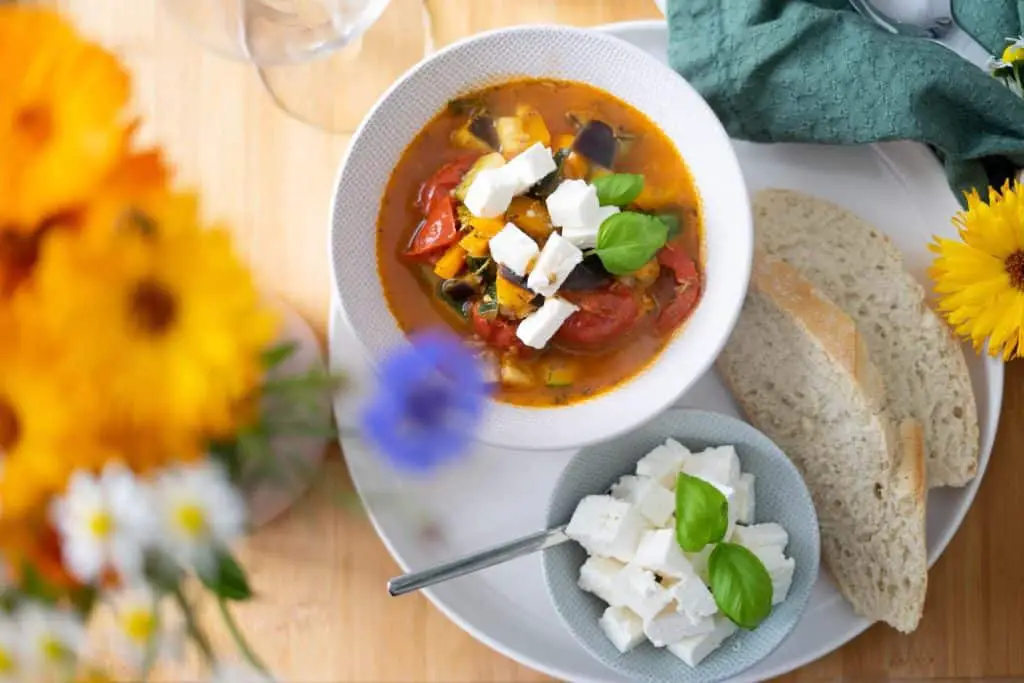 white sliced cheese on soup