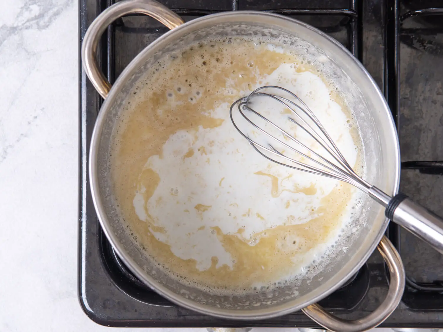 Cook for another 5-7 minutes, or until the roux has turned a light golden color.