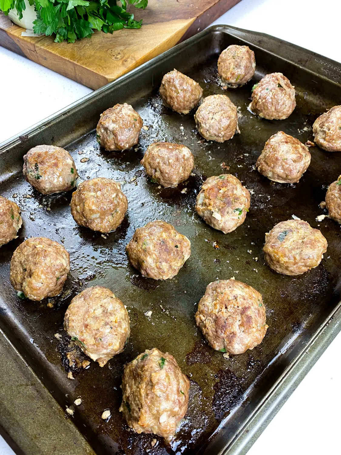 Bake for an additional 8 to 10 minutes, or until an instant-read thermometer inserted into the thickest section of several of the meatballs registers 160 degrees Fahrenheit. Discard after removing from heat.